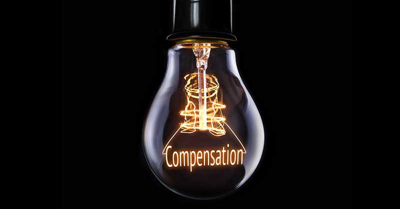 Conceptual image of a lightbulb that says "Compensation"
