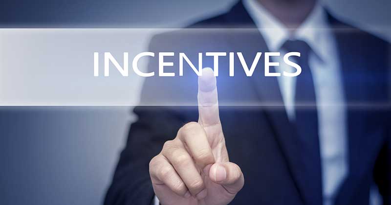 Conceptual image of a man choosing incentives