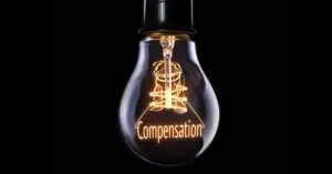Conceptual image of a lightbulb that says "Compensation"